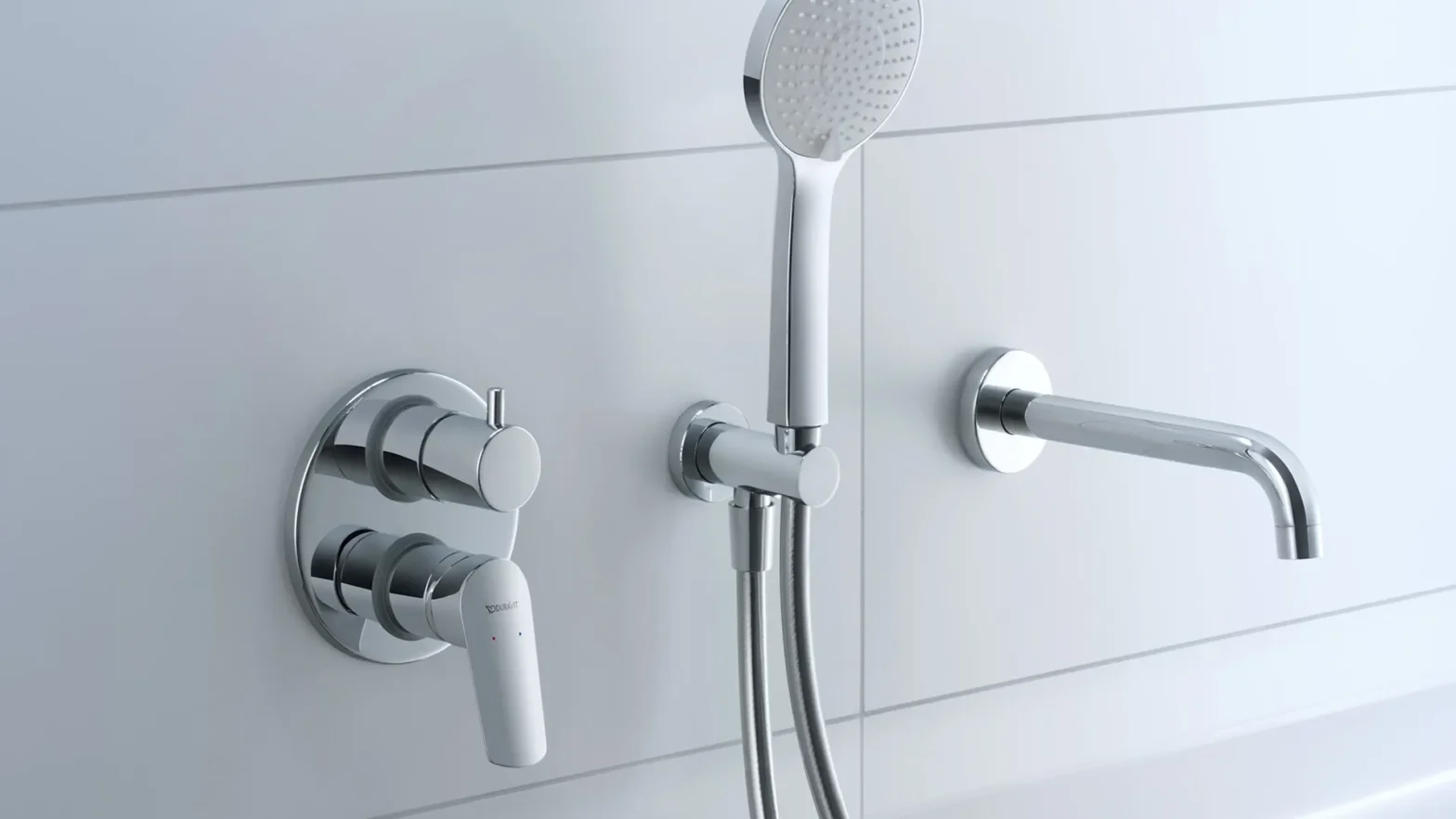 Chrome wall-mounted shower system with handheld head and round control knobs that are easy to reach from the tub or shower area.